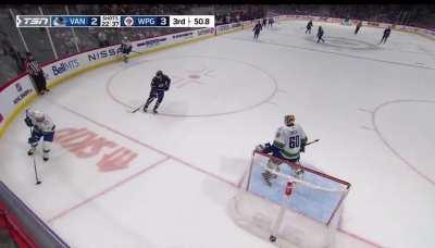 JT Miller screams at Collin Delia to go to the bench, then slams his stick on the back of the net