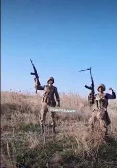 Azerbaijani soldiers filming themselves for Tiktok are interrupted by an artillery strike behind them