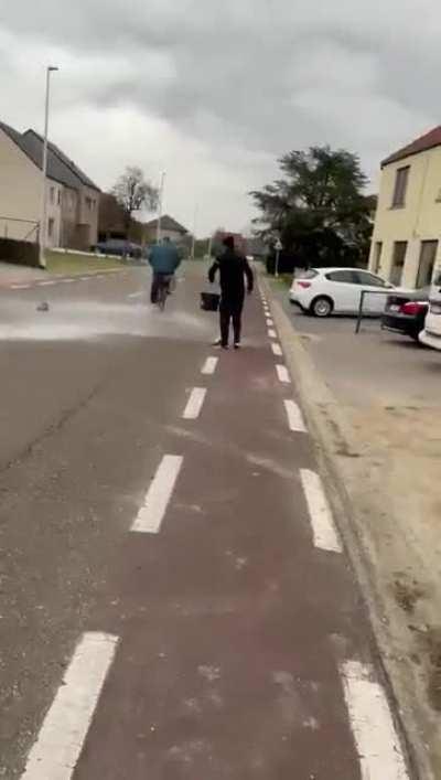 Coward tries to spit on a random guy's car