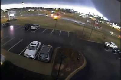 CCTV from a bank in Holly Springs, MS caught a huge EF4 Tornado passing by - Dec. 23, 2015
