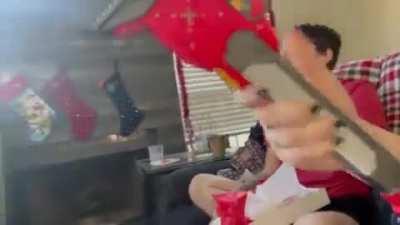 Best reaction to a Christmas gift.