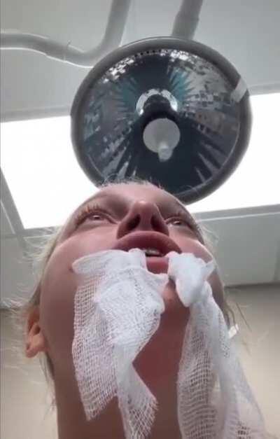 Girl has certain priorities while coming out of anesthesia at a dentist&rsquo;s office.