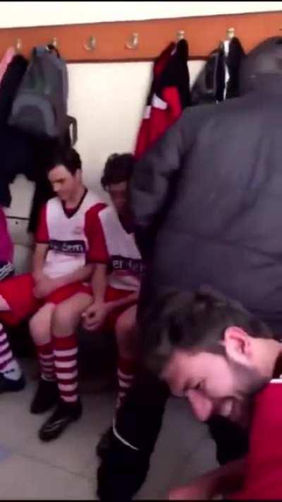 Coach motivating his team