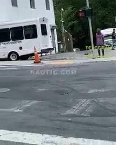 A naked guy in the street starts playing with his bum