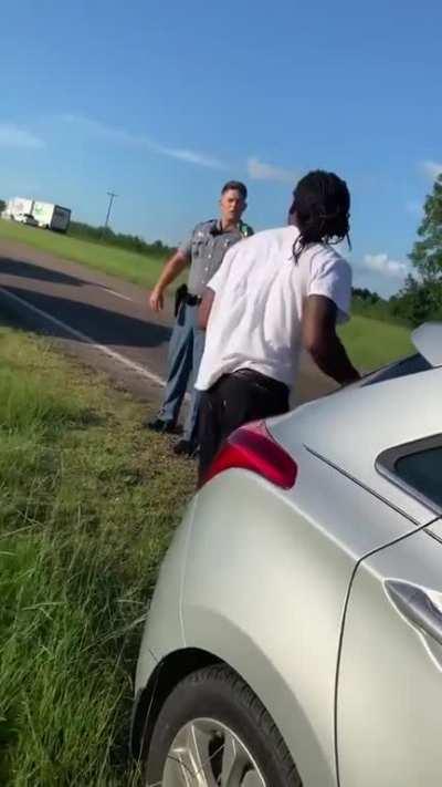 Guy gets grabbed by the neck and body slammed by police officer