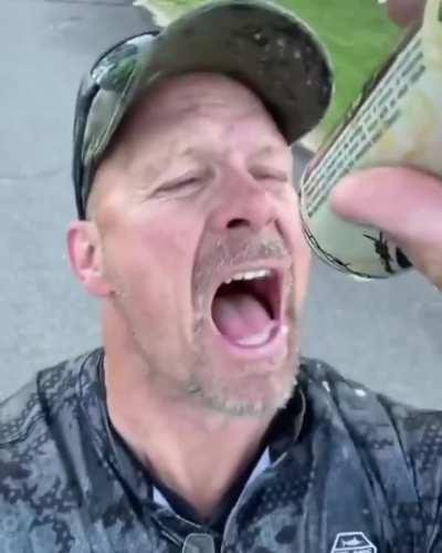 Even on a windy day, Stone Cold can't turn down a beer