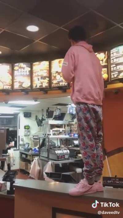 Basically disturbing customers and or staff of this Taco Bell