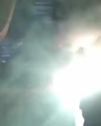 To shoot a flare out of a window