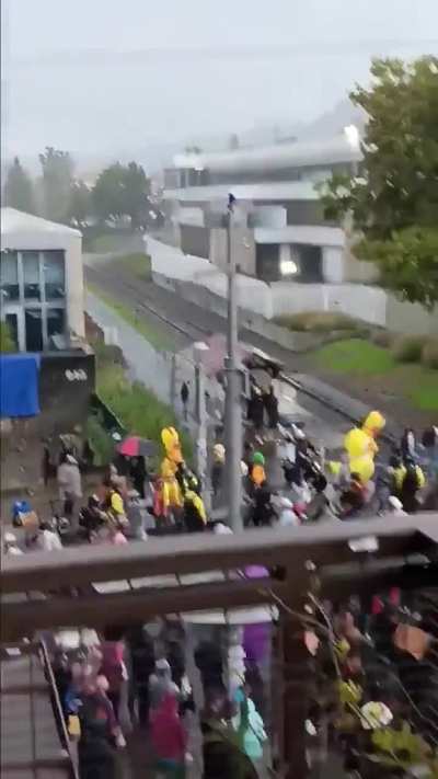 Naked bike riders ascend on ICE facility in Portland