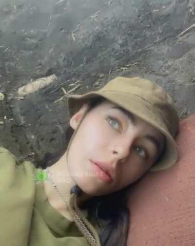 In the video, a young girl - a combat medic under fire from artillery, is in one of the hottest spots.