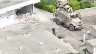 Drone footage showing intense Close Quarter Combat between an Afghan insurgent and operators of the SSG's 5th Battalion during a clearance operation at a Paramiliatary base in Bannu city of Pakistan
