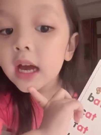 This cute Thai girl teaching English.