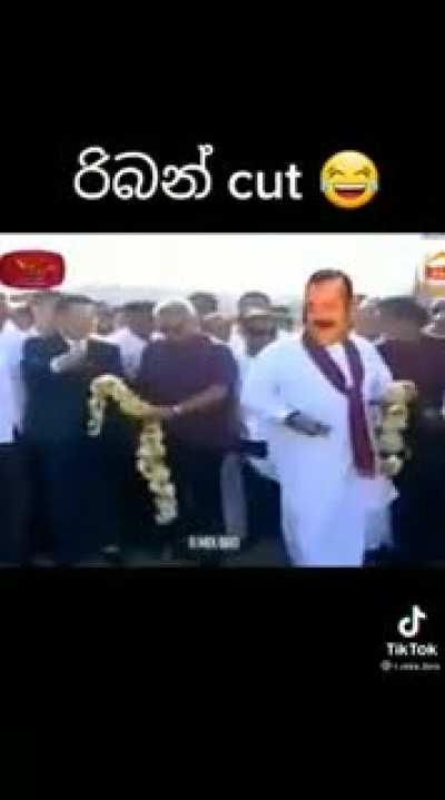 Sri Lankan President using a senior CCP official as a personal servant.