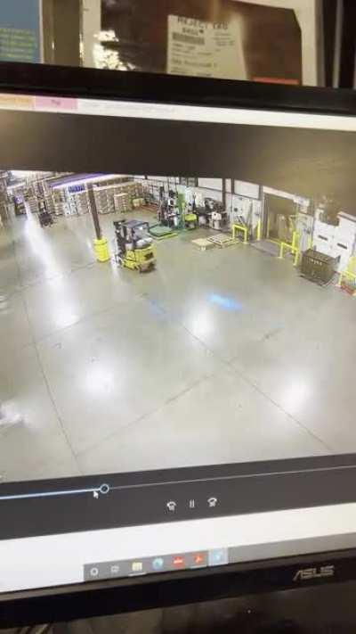 Forklift crashes in an empty warehouse