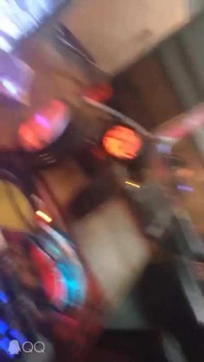 Asian parents beating their son