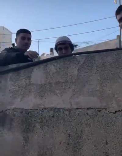 IDF soldiers are taking orders from the illegal Jewish settlers (who are trying to steal Palestinian homes). This settler told them to film the protestors who were fighting to keep their homes. The next day; the protestors were arrested by the IDF.