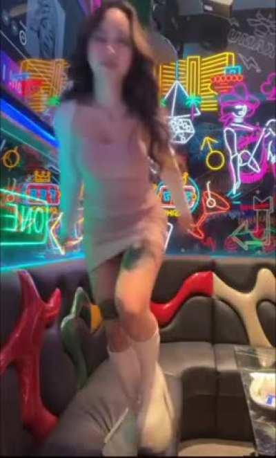 Petite Asian shows off her dress