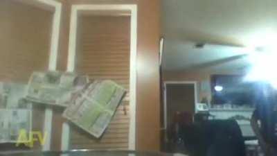 Playing jenga with bricks on a glass table