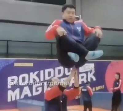 Just two friends playing on the trampoline