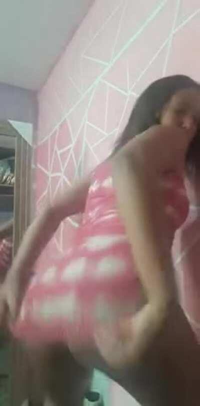 Provocative sexy Brazilian twerks in revealing short dress