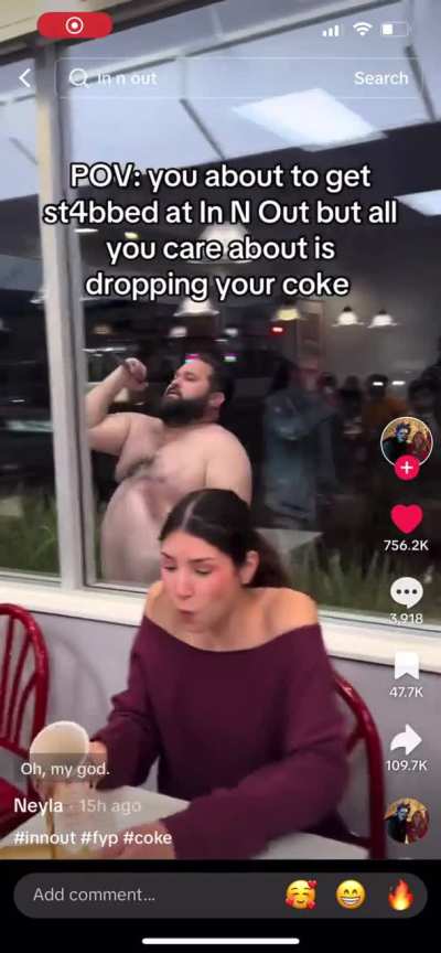 Guy brandishing knife starts stabbing window of In N Out. 