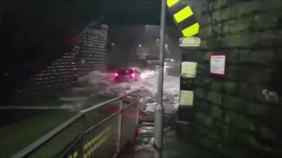 To drive through a flood