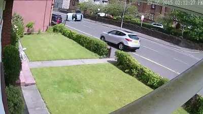 Apparently wearing a red shirt and standing in front of a car isn't enough to be visible to some...