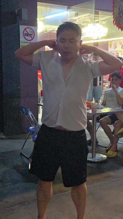 A man beaten by two women saved by another man in convenient store at Karpal Singh Drive