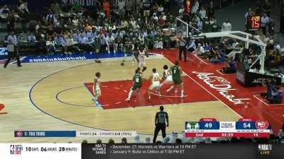 [Highlight] Trae Young trades shots with Bobby Portis and makes back to back threes, including one at the (very large) logo