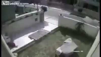 Woman walks away after narrowly missing being crushed by a car after an apparent malfunction (unknown)