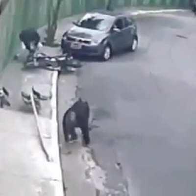 Motorcyclists attempt to rob couple at gunpoint.