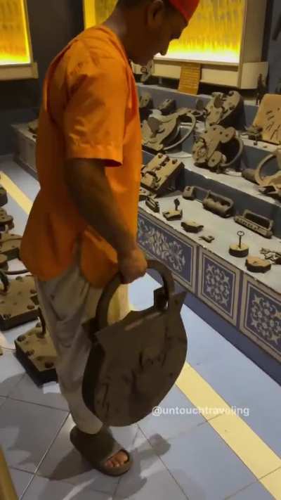 Massive antique padlock at Ahmedabad's Doc's Locks Museum, India, a collection of over 2,000 locks from 50+ countries, housed in a doctor's residence and open to visitors, each padlock weighs around 17lbs