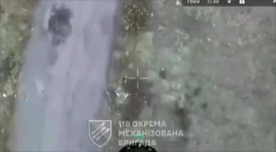 Russian soldier shoots himself, while he runs away from a drone. Avoiding death (and possible suffering) through the drone. (Music from source)
