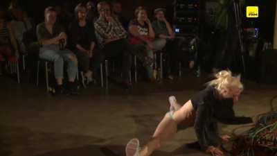 Lady's breasts exposed during handstand and cartwheels