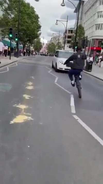 Doing a wheelie on public road.