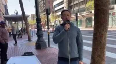 Trans person points gun at preacher