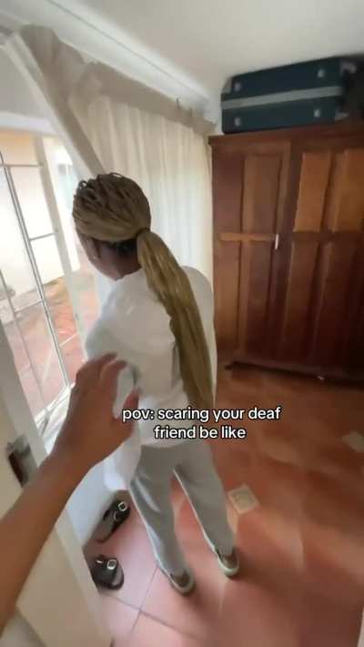 Scaring their deaf friend