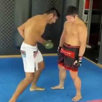 Ate multiple body shots like it's nothing