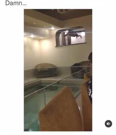 Lets play a game called jumping off a second floor and dive into the pool