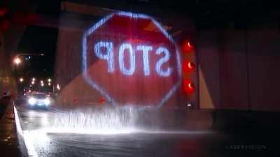 Water Being Used to Project a Stop Sign in a Tunnel in Sydney, Australia