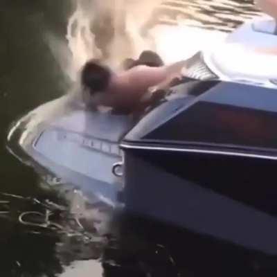 Jumping from the pier to the boat and landing on a slippery surface