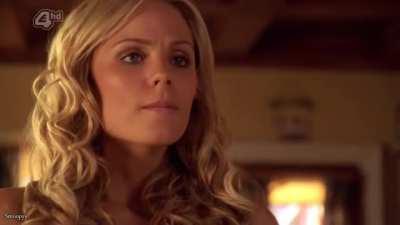 Laura Vandervoort in a bikini