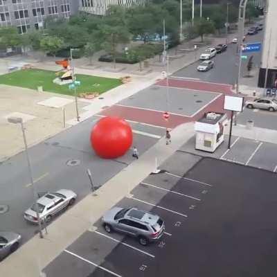 Giant red ball from an art installation broke free in Toledo