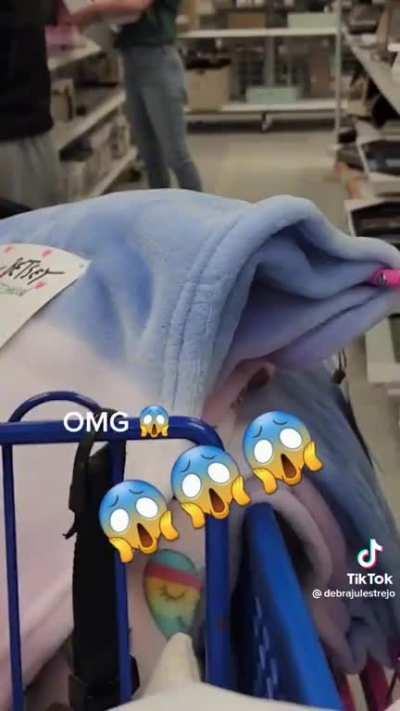 Man walks around store with huge weapon