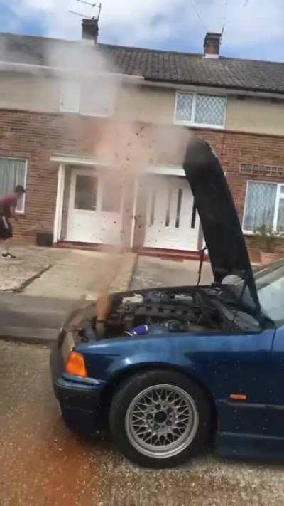 Taking the cap off a hot car radiator