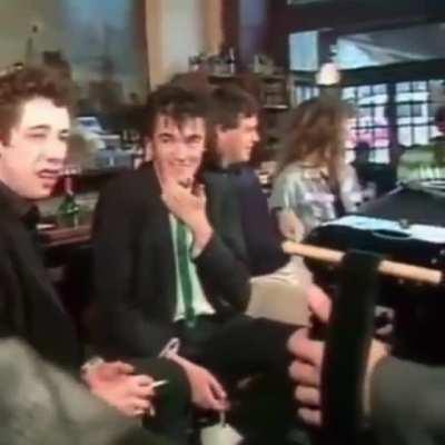 Celtic folk punks The Pogues perform Dirty Old Town in a pub, 1986