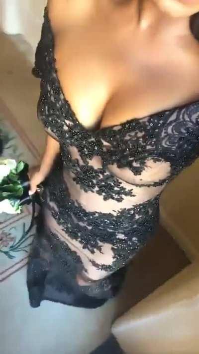 Christina showing off dress via SC