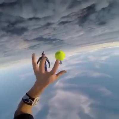 Playing catch while skydiving