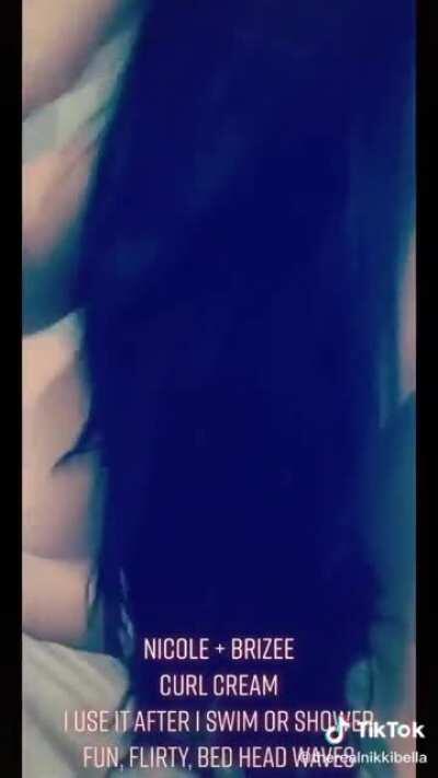 Nikki Groping herself