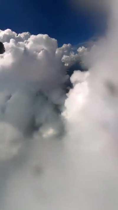 Skydiving through massive clouds